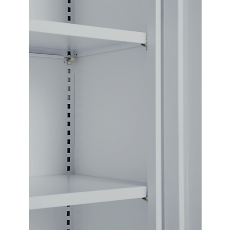 Inside view of a cabinet with two shelves, light grey. Rows of holes are visible on the sides.