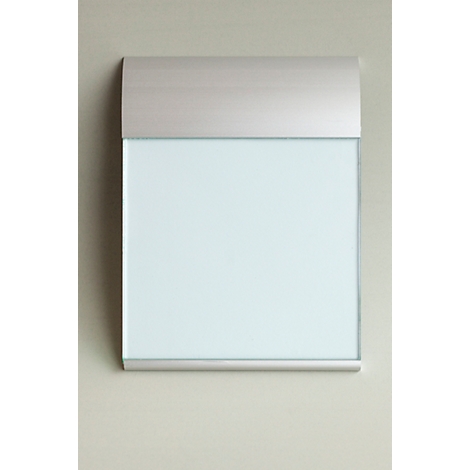 Rectangular, white board with silver frame and cover, on light gray wall. Slightly arched at the top.