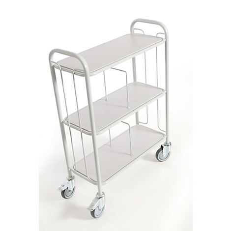 White serving cart with three shelves and castors, isolated on white background.