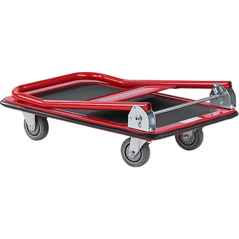 Chariot de transport rouge et pliable avec quatre roues, zone de chargement noire et poignée argentée.