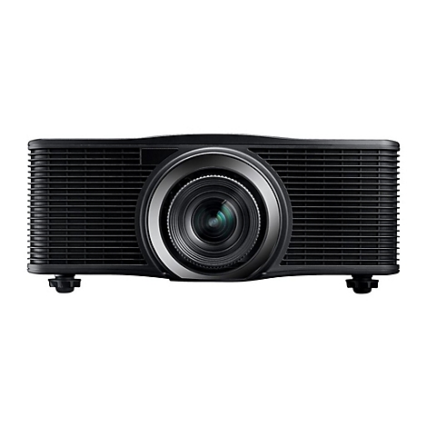 Projecteur noir avec lentille et fentes de ventilation. Anneau métallique gris autour de l'objectif, deux pieds en bas.