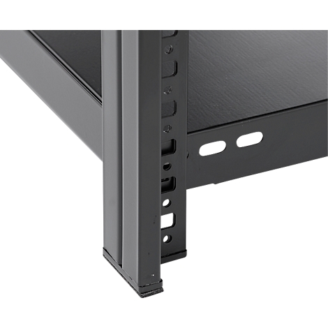 Close-up of a corner of a black metal shelf, with perforations and recesses for fixing.