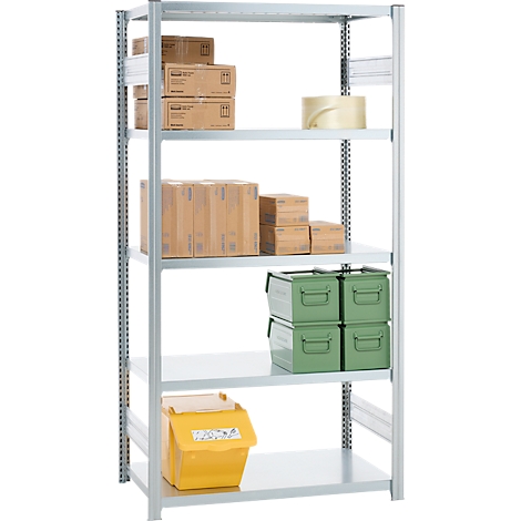 Metal shelf with goods and boxes in various colors. Yellow box at the bottom, green boxes, brown cardboard boxes on the shelves.