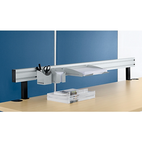 Office desk with an aluminum holder, desk tray, pen holder, notepad and scissors.