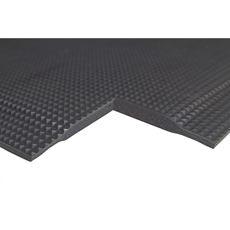 A black rubber mat with raised, diamond-shaped patterns. The edge is cut to show the layering.