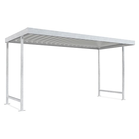 A silver metal canopy, rectangular with a ribbed underside, stands on four slender pillars.
