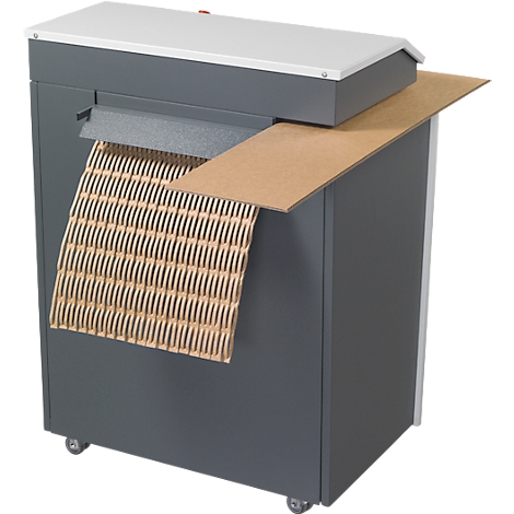 Grey cardboard padding machine with paper output and brown packaging. On rollers.