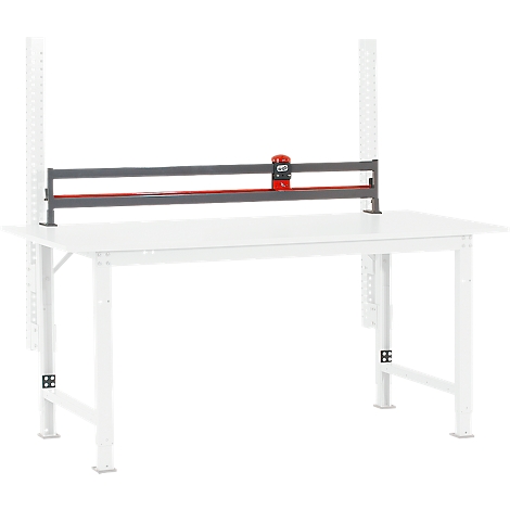 Gray cutting device over a white table. Red accent. White shelves behind the table.