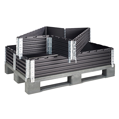 Black, foldable boxes, partially open, on a gray pallet. Metal hinges connect the boxes.