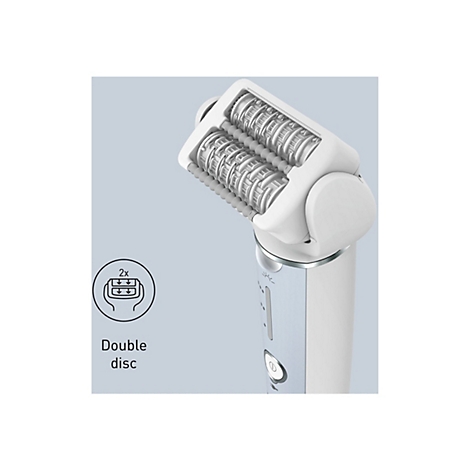 Vue détaillée d'un rasoir électrique blanc avec doubles disques de rasage disposés en angle. Texte : Double disque.