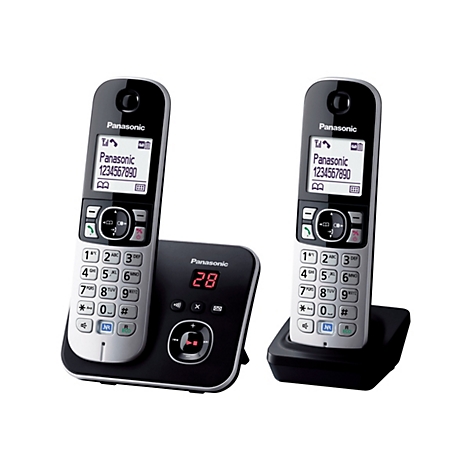 Zwei Panasonic DECT-Telefone mit Basisstation vor weißem Hintergrund.