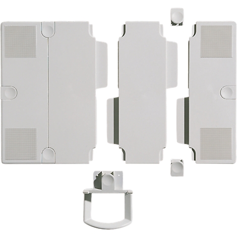 Disassembled white plastic parts. Individual components, including brackets and plates, are scattered.