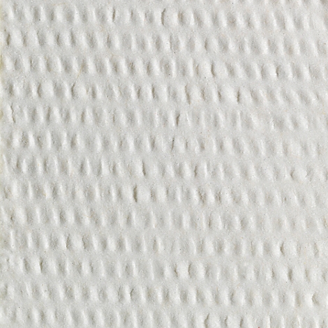 Primer plano de papel blanco texturizado con un patrón regular de puntos hundidos.