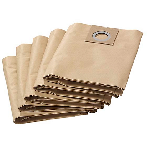 Close-up of brown vacuum cleaner bags with a hole and metal ring.