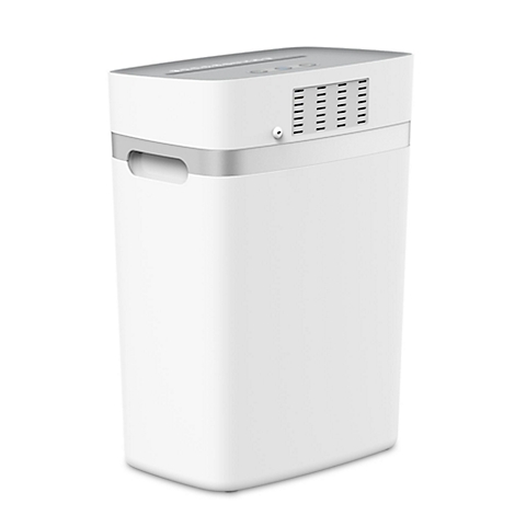 White paper shredder with gray accents and ventilation slots. There's an input slot on the top.