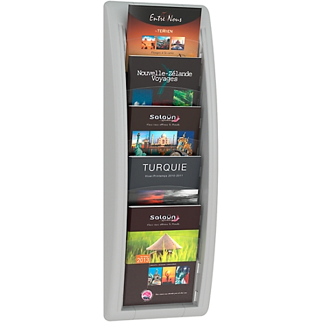 White brochure holder with brochures displaying text in different languages.