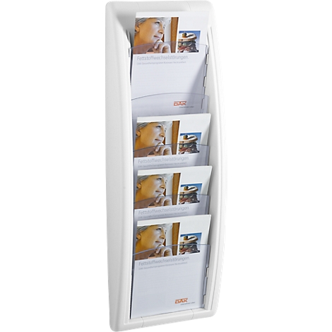 White brochure holder with multiple compartments, filled with brochures. The brochures display a portrait of a woman, text, and a company logo.