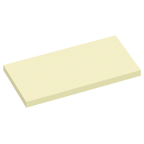 Bloc rectangulaire jaune clair, photographié légèrement en biais du dessus.