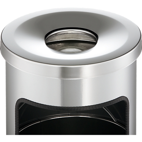 Close-up of a silver trash can with a circular opening and a rectangular opening on the side.