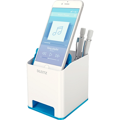 White and blue pen holder with phone and pens. A music player is visible on the phone. Blue accents on the pen holder.