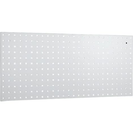 White pegboard with many small holes. A black magnet is visible.