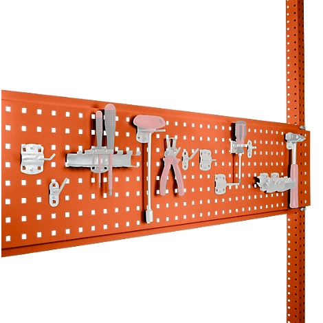 Orange pegboard with tools: pliers, wrench, and hooks.