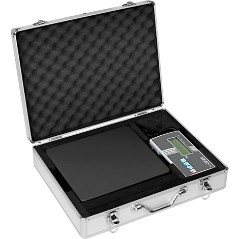 Open silver case with scale and control panel. Black case cover with nub foam. Scale with display, buttons, text.