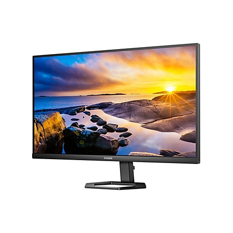 Ein schwarzer Philips-Monitor, der ein Landschaftsbild mit Sonnenuntergang zeigt. Das Display hat einen schwarzen Rahmen, einen Ständer und das Philips-Logo.