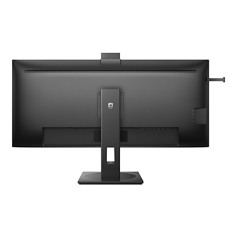 Rückansicht eines schwarzen Philips Monitors, der auf einer quadratischen Basis steht. Der Monitor hat eine Webcam und mehrere Anschlüsse.