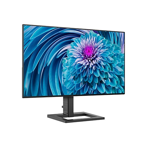 Monitor mit einem blau-violetten Blumenmuster, vor weiÃŸem Hintergrund.