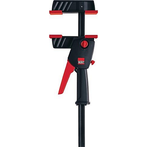 Une serre-joint noire avec une poignée rouge et des mâchoires rouges. Le logo 'BESSEY' est visible.