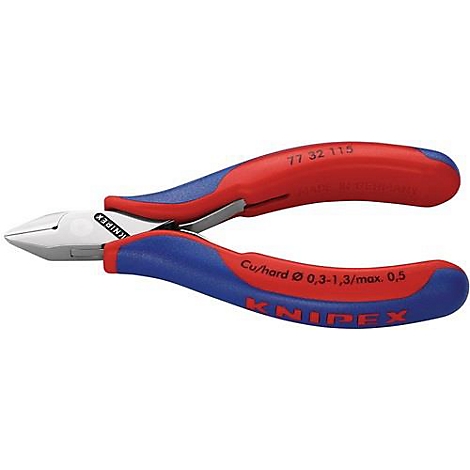 Pince coupante Knipex avec poignées rouges et bleues. Inscription : 77 32 115, Cu/hard Ø 0,3-1,3/max. 0,5. Logo du fabricant.