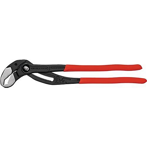 Une clé à molette avec un corps noir et des poignées rouges ; la pince est légèrement inclinée.