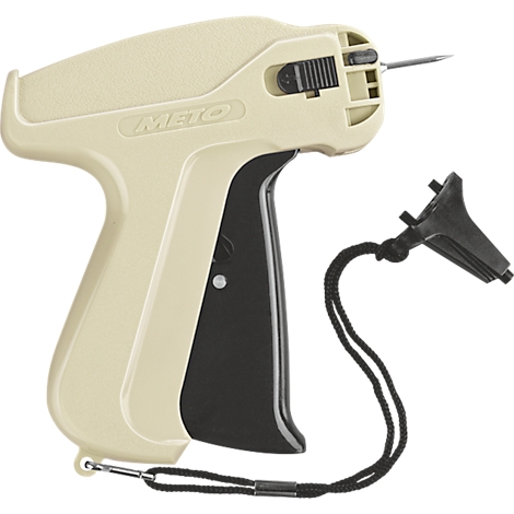 Pistolet d'étiquetage beige avec poignée noire et protège-aiguille. Inscription : METO.