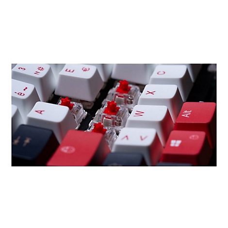 Nahaufnahme einer mechanischen Tastatur mit weißen und roten Tasten. Rote Schalter sind im Fokus. Einige Tasten sind mit Buchstaben und Symbolen beschriftet.