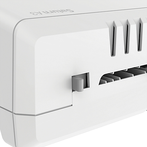Détail d'un appareil électronique blanc avec des éléments gris et l'inscription Saturn A3.
