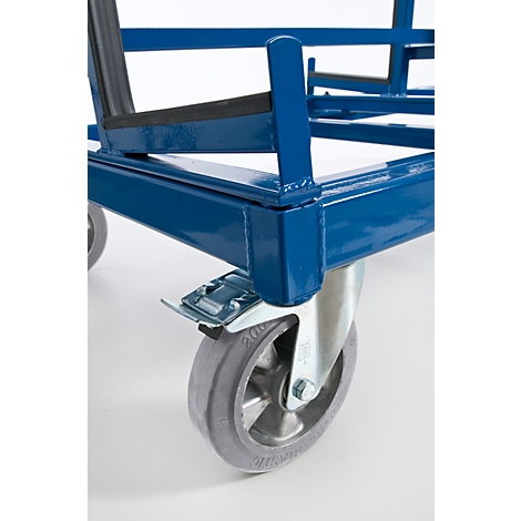 Blue metal cart with a grey wheel. The cart has angular shapes, black rubber on the top surface, and a silver brake.