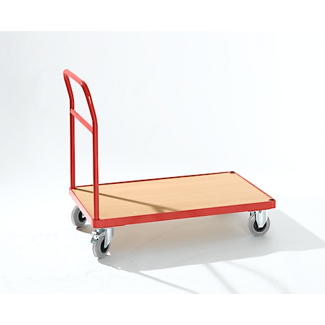 A red transport trolley with a wooden top and four wheels, in front of a white background.
