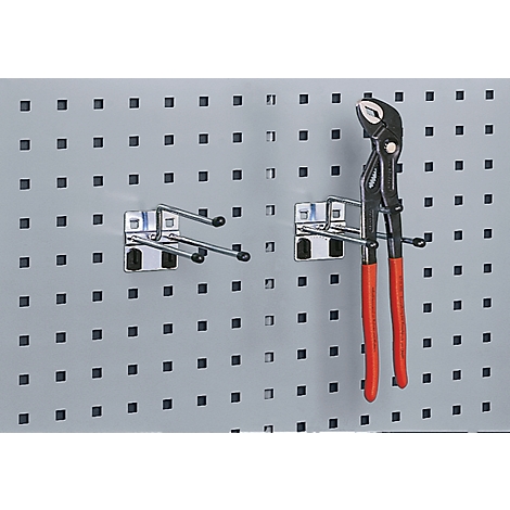 Grey pegboard with metal hooks. Pliers with red handles hang on a hook.