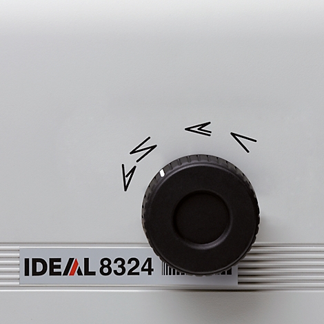 Gros plan d'un bouton rotatif noir avec des symboles de flèches et l'inscription IDEAL 8324.