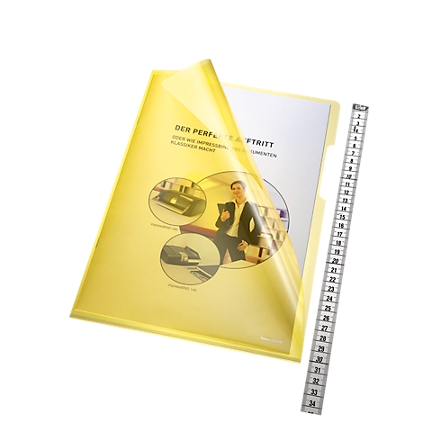 Chemise de présentation jaune avec documents, à côté d'une règle.