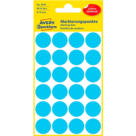 Feuille de pastilles de couleur bleu clair, emballage jaune avec texte.