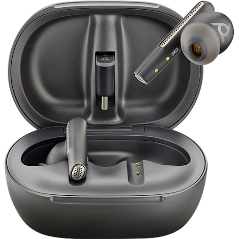 Dark gray earbuds in an open charging case. One earbud sits in the case, one is next to it.