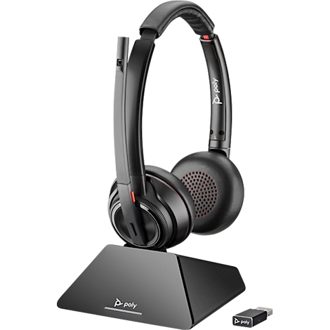 Black headset with charging station and dongle. Poly logo.