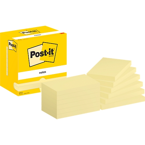Blocs-notes Post-it jaunes dans une boîte et séparément. Sur la boîte, il est écrit "Post-it".