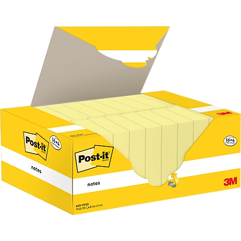Gelbe Post-it-Notizen in einem Karton. Der Karton ist geöffnet, und die Notizblöcke sind sichtbar. Auf der Verpackung steht "Post-it" und "3M".