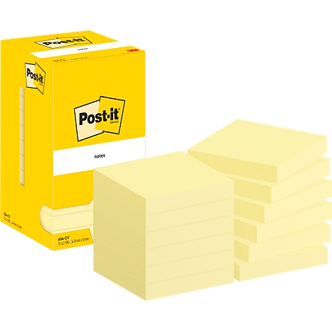Post-it jaunes, emballés et en vrac, sur fond blanc.