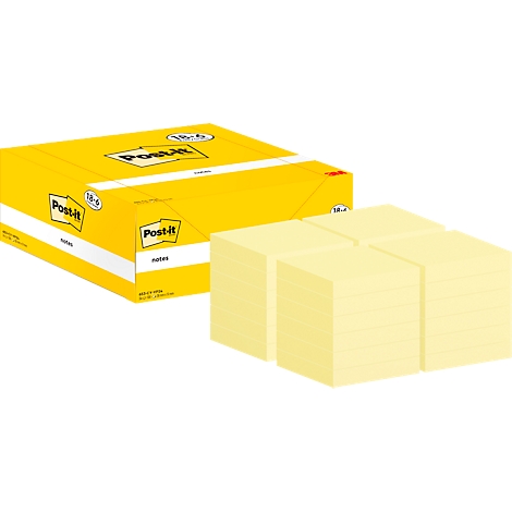 Bloc-notes Post-it jaunes et une boîte avec le logo Post-it. Piles de blocs jaunes, une partie de la boîte en arrière-plan.