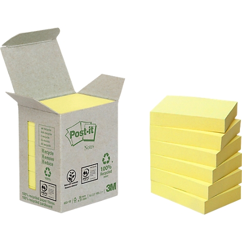 Two yellow Post-it notes, one in a box, and a stack next to it. The box with the Post-it logo.