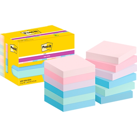 Stapels Post-it notes in verschillende kleuren, naast een gele doos met het Post-it logo.